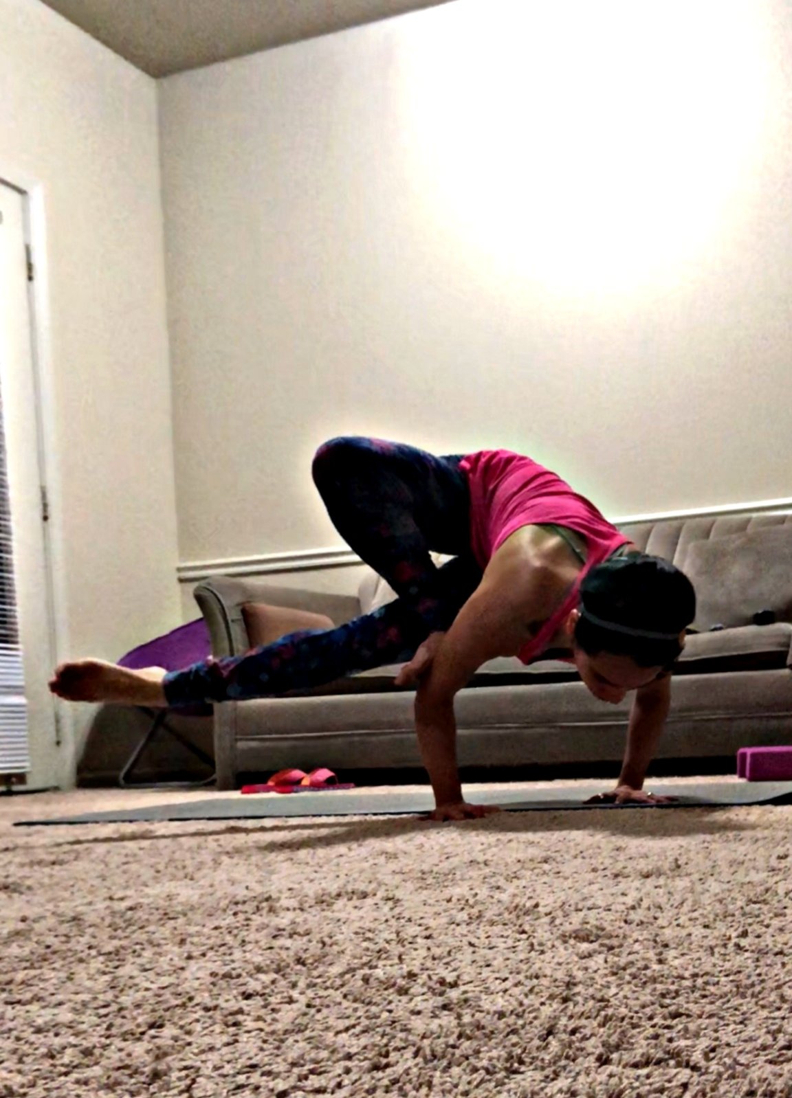 Riddhi practicing a single-person arm balance
