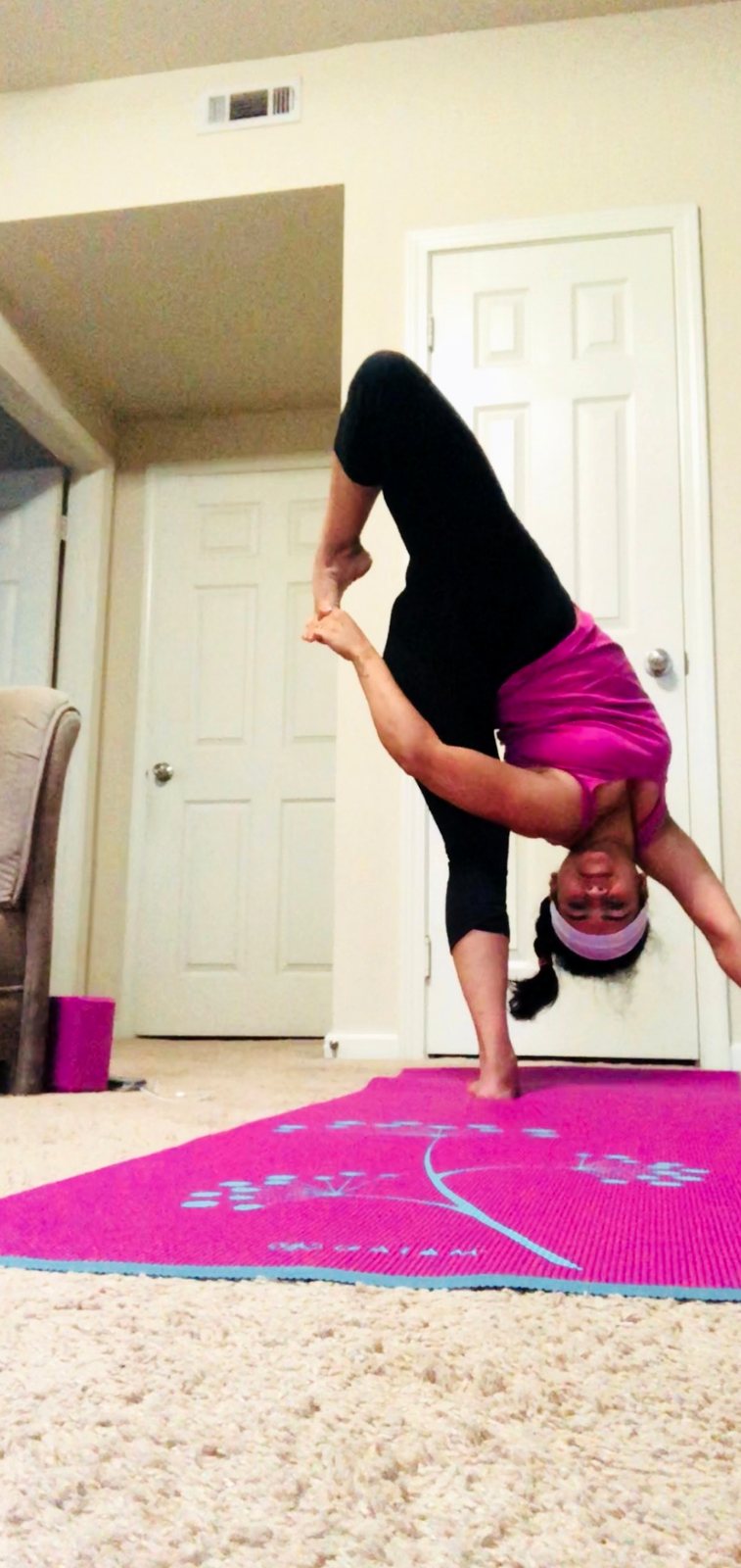 Riddhi practicing a standing balance pose
